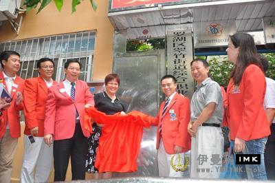 Shenzhen Lions Club launched 10 red Lion costumes in Luohu District. Assistive standing